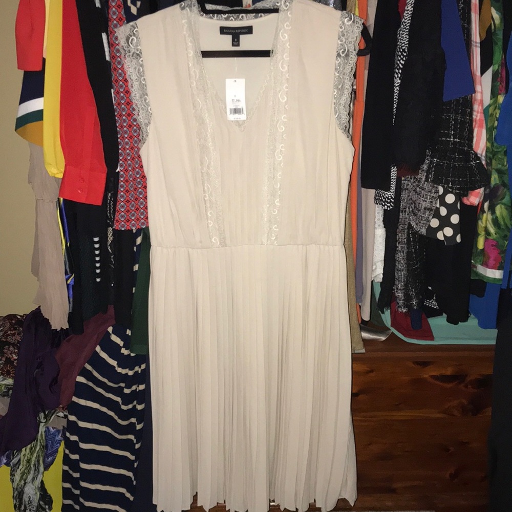 Cream pleated dress NWT